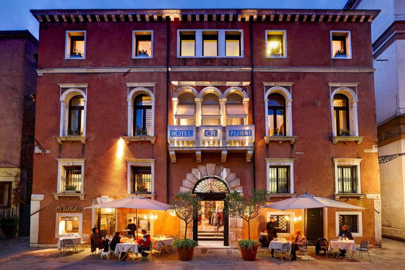 Ca'pisani Hotel with exterior with cobblestone patio and outdoor seating