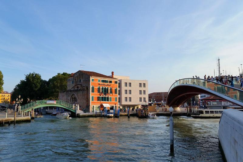 Hotel Santa Chiara exterior with bridges crossing the adjacent waterway