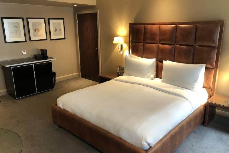 A superior guest room with a king-sized bed.