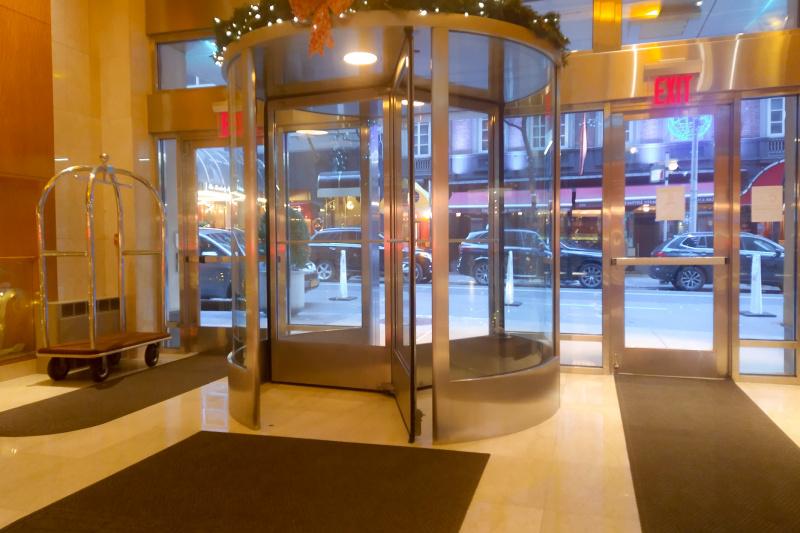 Lobby with revolving doors and exit doors