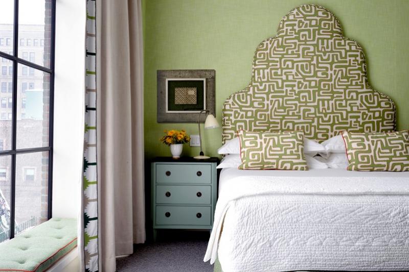 Guestroom with modern decor, bed and nightstand