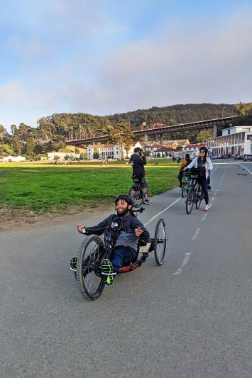 Travelers bike near Crissy Feilds near the Golden Gate Bridge