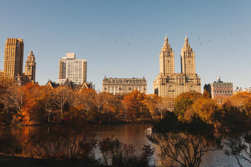 View of the lush Central Park foliage in autumn and lake