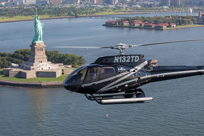 View of the majestic statue of liberty from a helicopter
