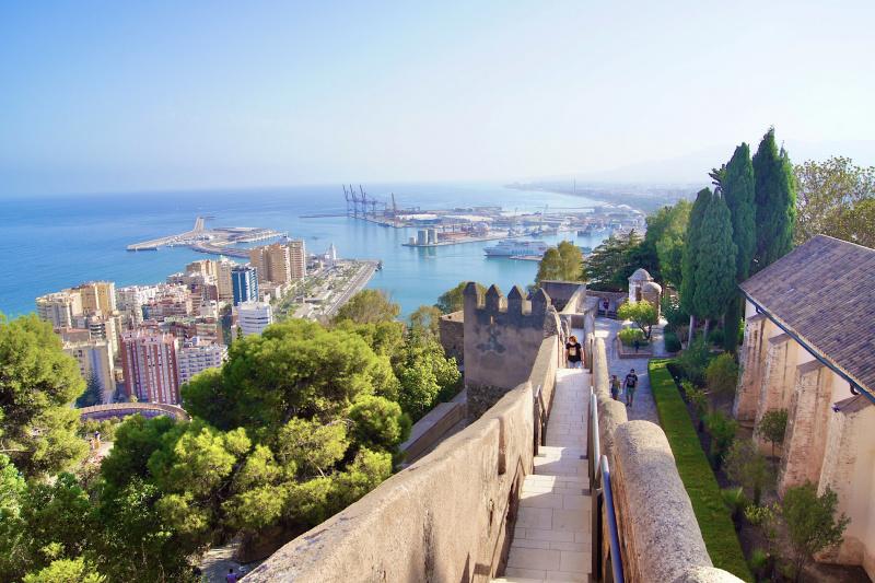 The view from the castle walls, looking over Malaga city, port and the sea.